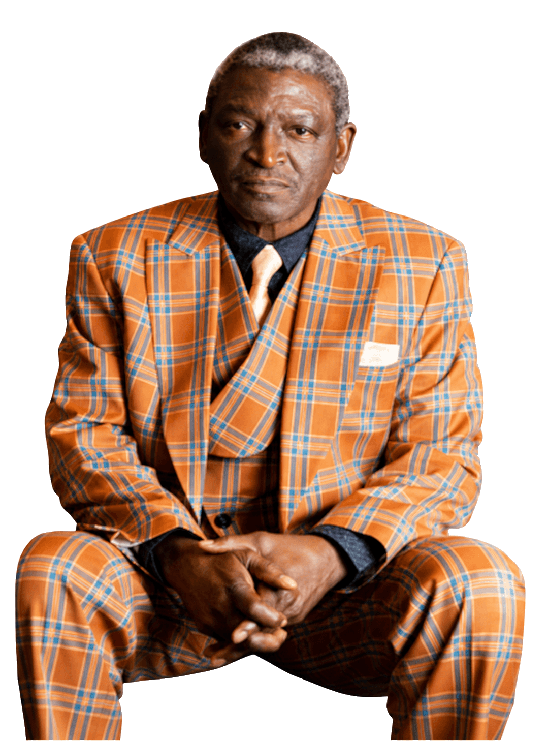 Henry Jones in a plaid suit